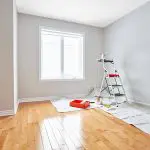 how interior painting changes a space with fresh neutral wall paint in a bright room during an interior painting project