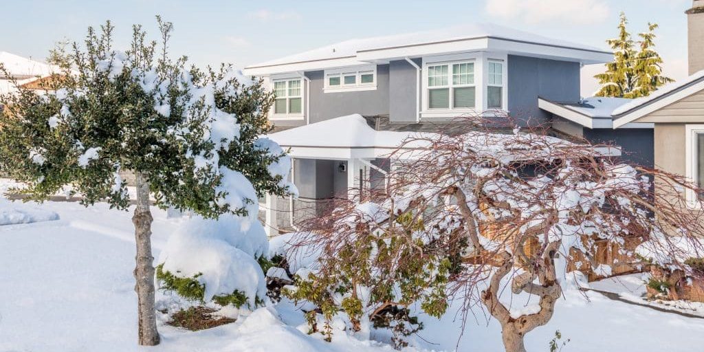 Oklahoma City home exterior in winter with well-maintained paint